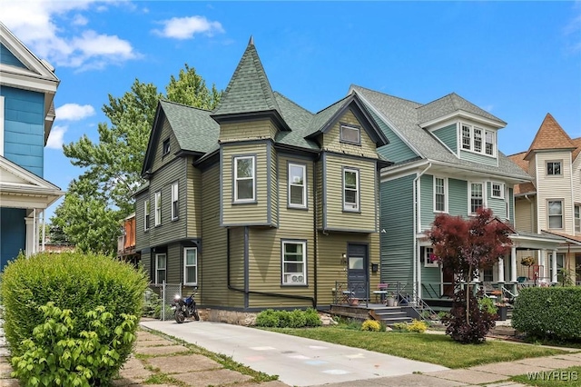 228 Potomac Ave, Buffalo, NY 14213 - victorian home with roof with shingles