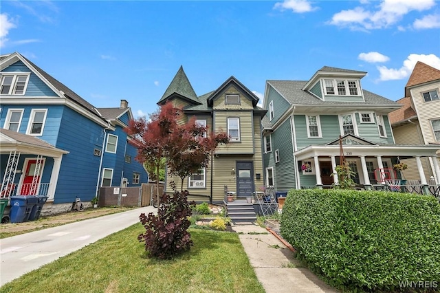 228 Potomac Ave, Buffalo, NY 14213 - american foursquare style home featuring a porch