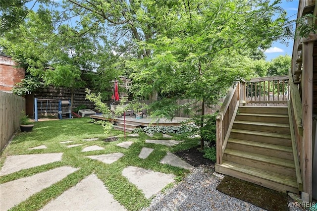 228 Potomac Ave, Buffalo, NY 14213 - fenced backyard with a wooden deck and stairs