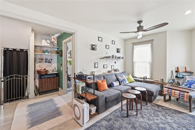 228 Potomac Ave, Buffalo, NY 14213 - living room featuring a ceiling fan and light wood-style floors