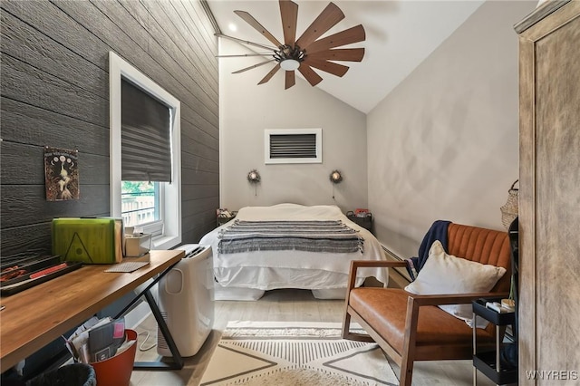 228 Potomac Ave, Buffalo, NY 14213 - bedroom with lofted ceiling, wood finished floors, and a ceiling fan