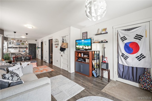 228 Potomac Ave, Buffalo, NY 14213 - living room with wood finished floors and a chandelier