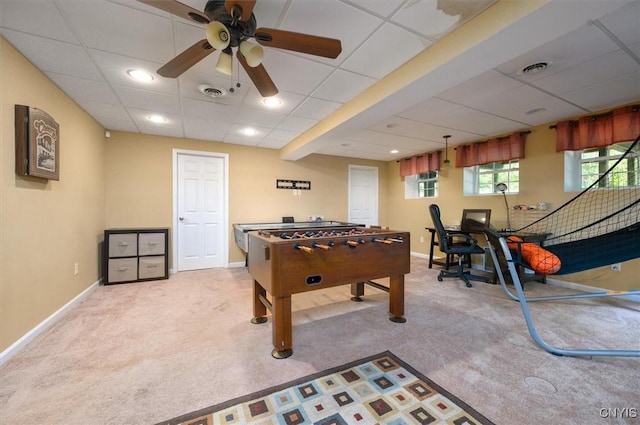 8278 Luchsinger Ln, Lysander, NY 13027 - rec room with carpet flooring, a ceiling fan, and a drop ceiling