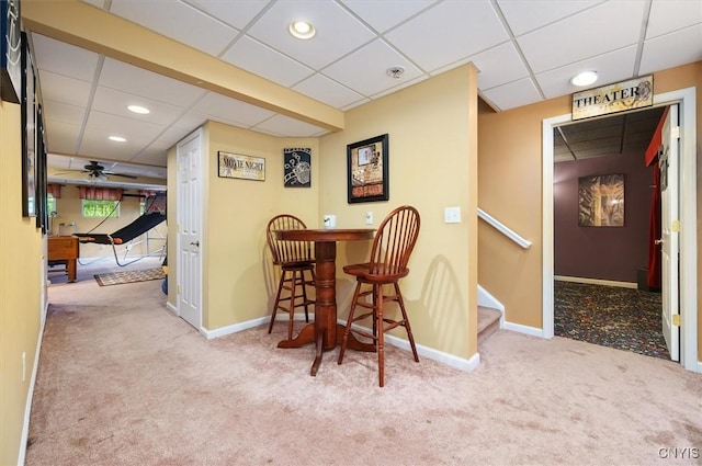 8278 Luchsinger Ln, Lysander, NY 13027 - dining space featuring carpet floors, a paneled ceiling, ceiling fan, recessed lighting, and stairs