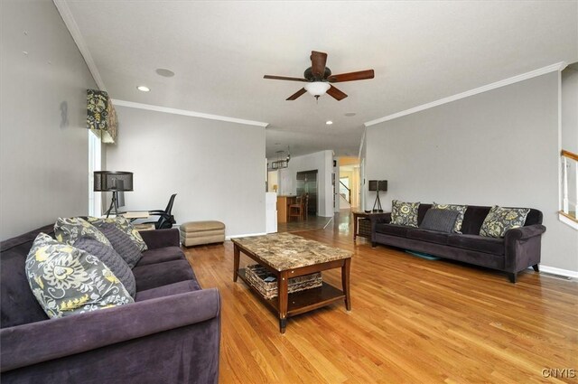 8278 Luchsinger Ln, Lysander, NY 13027 - living room featuring ceiling fan, crown molding, light wood-type flooring, and recessed lighting