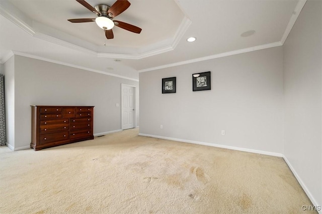 8278 Luchsinger Ln, Lysander, NY 13027 - spare room featuring a raised ceiling, light carpet, ceiling fan, ornamental molding, and recessed lighting