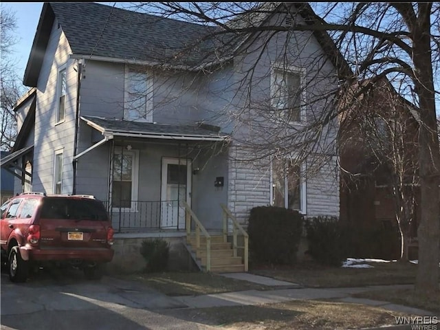 2210 24th St, Niagara Falls, NY 14305 - view of front of property with roof with shingles and covered porch
