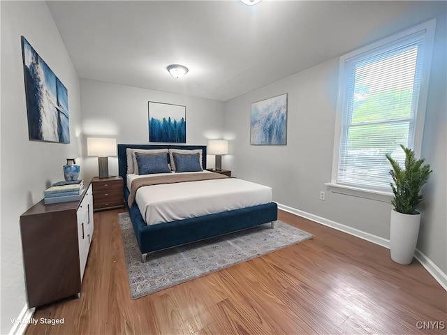 22 Frank St, Cortland, NY 13045 - bedroom featuring wood finished floors and baseboards