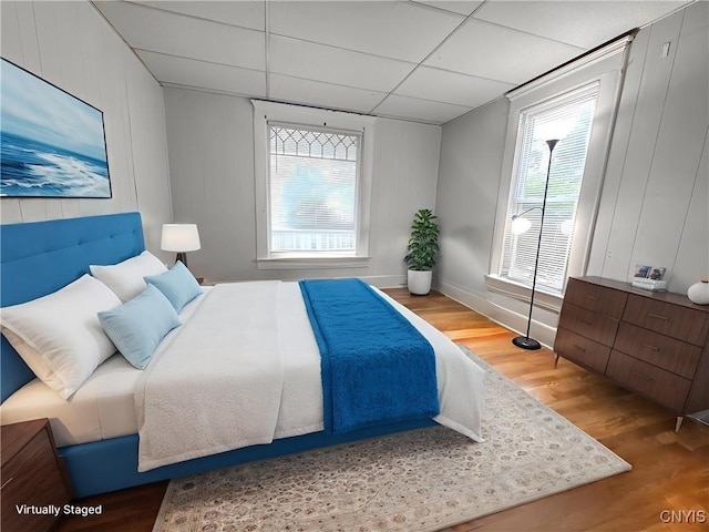 22 Frank St, Cortland, NY 13045 - bedroom featuring wood finished floors and a paneled ceiling