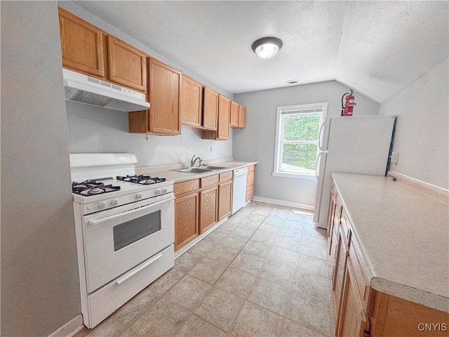19 Water St, Cortland, NY 13045 - kitchen featuring white appliances, under cabinet range hood, lofted ceiling, light countertops, and a textured ceiling