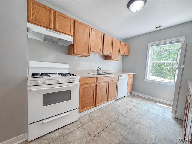 19 Water St, Cortland, NY 13045 - kitchen with white appliances, under cabinet range hood, and light countertops