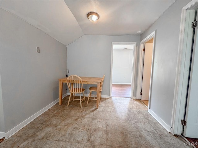 19 Water St, Cortland, NY 13045 - dining space with lofted ceiling and baseboards