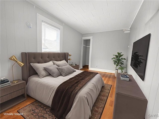72 Groton Ave, Cortland, NY 13045 - bedroom featuring crown molding and wood finished floors