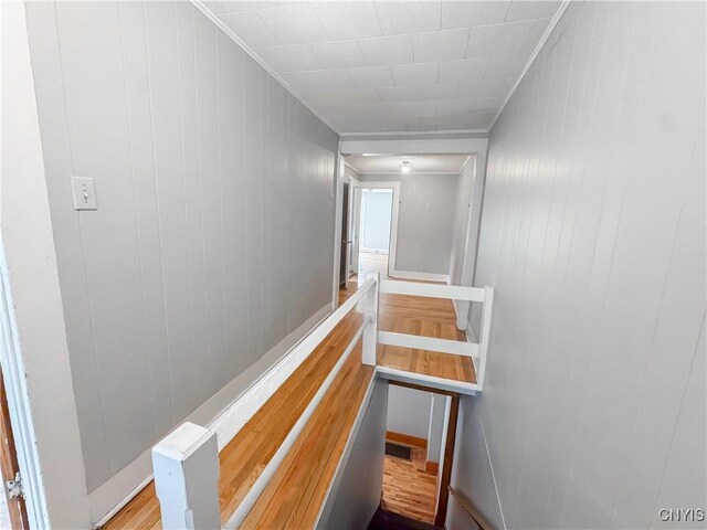 72 Groton Ave, Cortland, NY 13045 - stairs featuring wooden walls and crown molding
