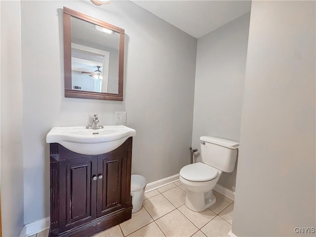 72 Groton Ave, Cortland, NY 13045 - bathroom with vanity, tile patterned floors, and ceiling fan