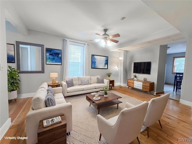 72 Groton Ave, Cortland, NY 13045 - living room with light wood finished floors and a ceiling fan