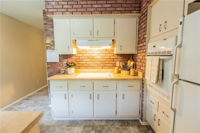 1100 Hatch Rd, Webster, NY 14580 - kitchen with white appliances, under cabinet range hood, light countertops, and white cabinetry