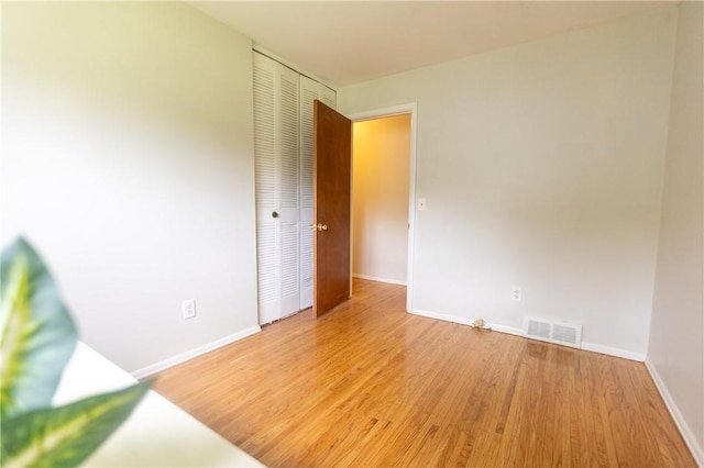1100 Hatch Rd, Webster, NY 14580 - unfurnished room featuring light wood-style flooring and baseboards