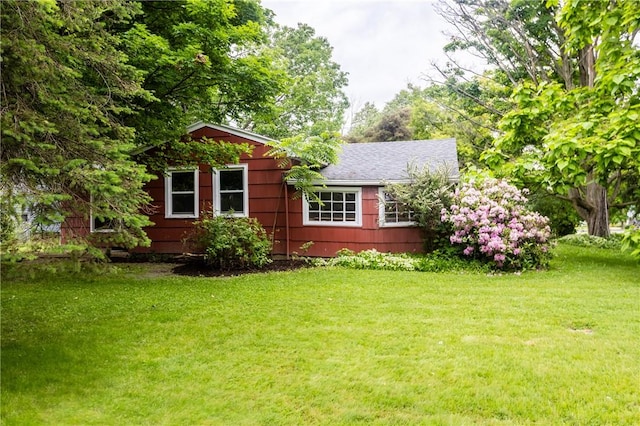 1100 Hatch Rd, Webster, NY 14580 - view of front facade with a front lawn and a shingled roof