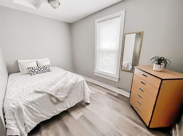 73 Groton Ave Unit 69-71, Cortland, NY 13045 - bedroom with light wood-style floors and baseboards