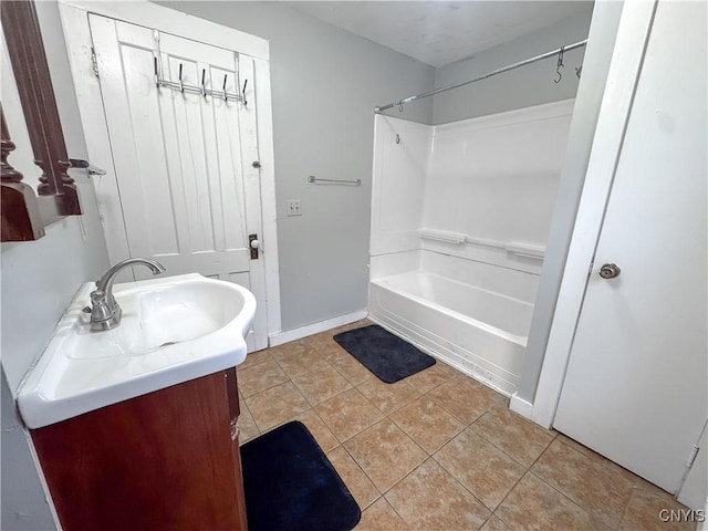 73 Groton Ave Unit 69-71, Cortland, NY 13045 - bathroom with vanity, tile patterned floors, and washtub / shower combination
