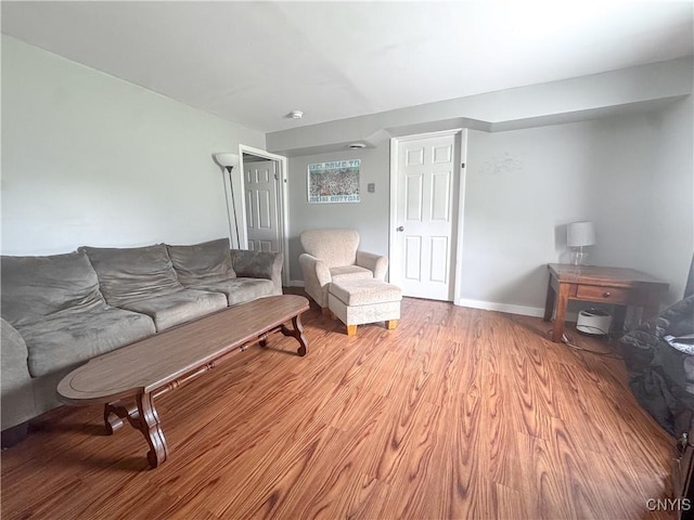 66 Groton Ave, Cortland, NY 13045 - living room featuring light wood-style floors and baseboards