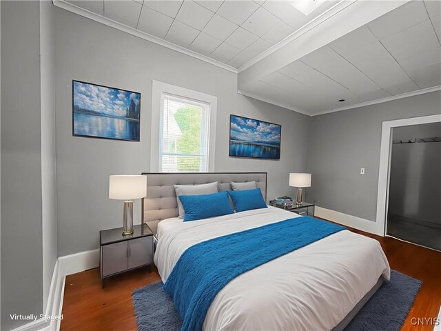 66 Groton Ave, Cortland, NY 13045 - bedroom featuring ornamental molding and wood finished floors