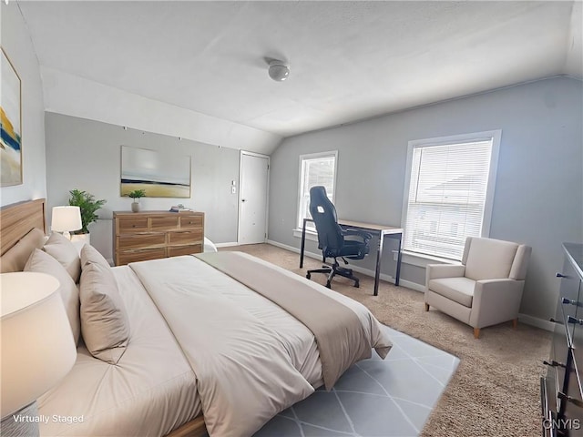 66 Groton Ave, Cortland, NY 13045 - bedroom with vaulted ceiling and carpet floors