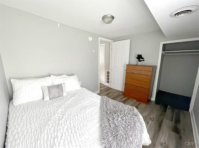 66 Groton Ave, Cortland, NY 13045 - bedroom with wood finished floors and a closet