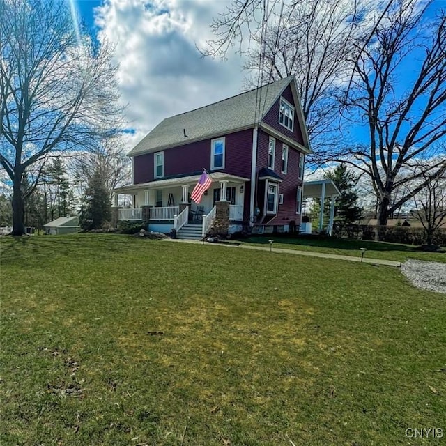 66 Groton Ave, Cortland, NY 13045 - rear view of property featuring covered porch and a lawn