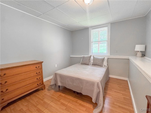 63 Groton Ave, Cortland, NY 13045 - bedroom with light wood-type flooring and a paneled ceiling