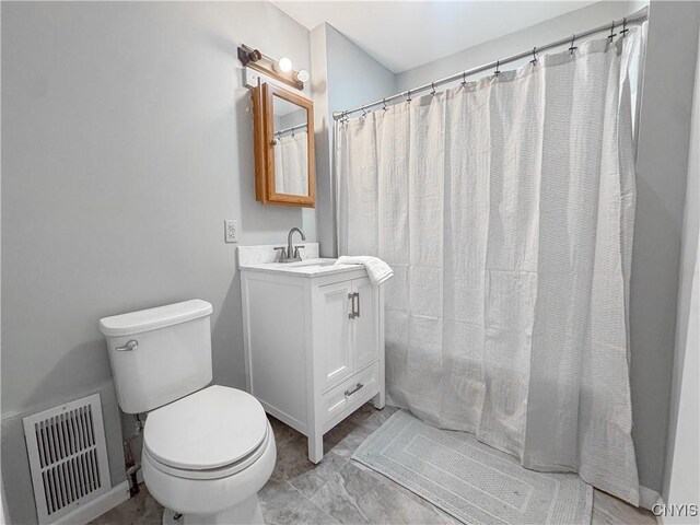 63 Groton Ave, Cortland, NY 13045 - bathroom with vanity and a shower with shower curtain