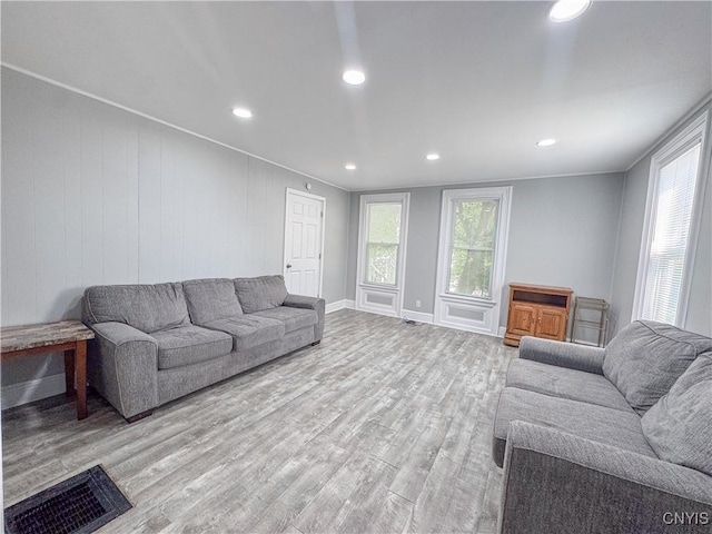 63 Groton Ave, Cortland, NY 13045 - living area featuring light wood-style floors and recessed lighting