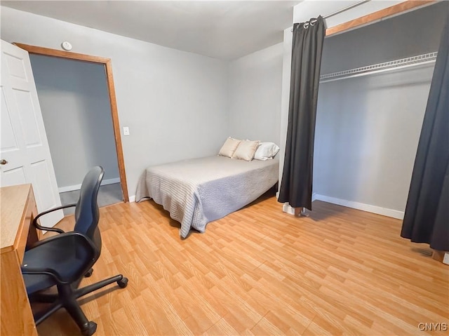 63 Groton Ave, Cortland, NY 13045 - bedroom with wood finished floors and a desk