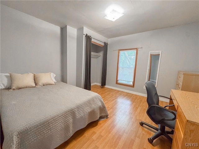 63 Groton Ave, Cortland, NY 13045 - bedroom featuring light wood-style floors and a desk