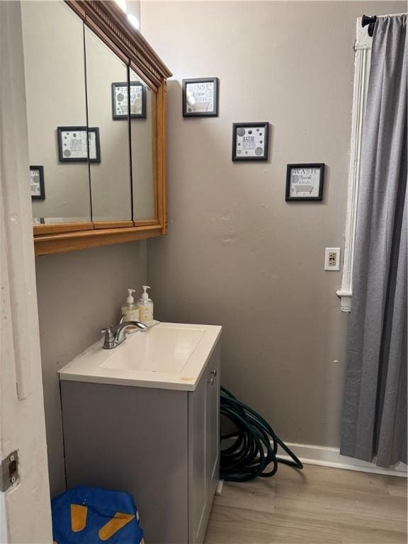 280 Ave D, Rochester, NY 14621 - bathroom with wood finished floors and vanity