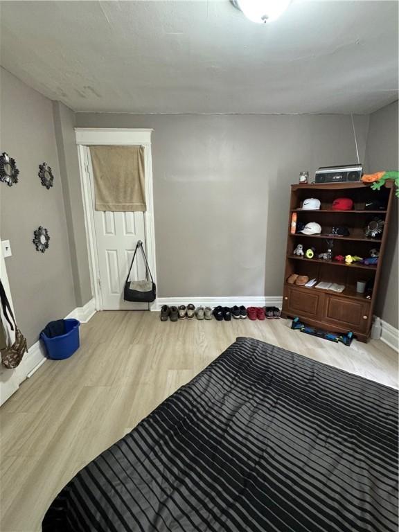280 Ave D, Rochester, NY 14621 - miscellaneous room featuring baseboards and wood finished floors