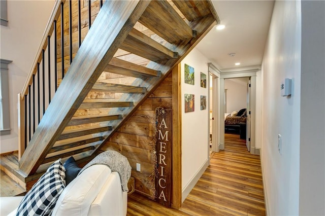 109 Unadilla Trail Rd, Pittsfield, NY 13411 - corridor featuring wood finished floors, stairs, and recessed lighting