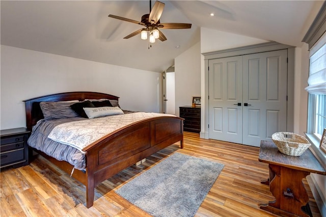 109 Unadilla Trail Rd, Pittsfield, NY 13411 - bedroom featuring lofted ceiling, multiple windows, light wood-style flooring, a closet, and a ceiling fan
