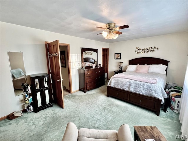 2 Whitetail Cir, Oswego-City, NY 13126 - carpeted bedroom featuring baseboards and a ceiling fan