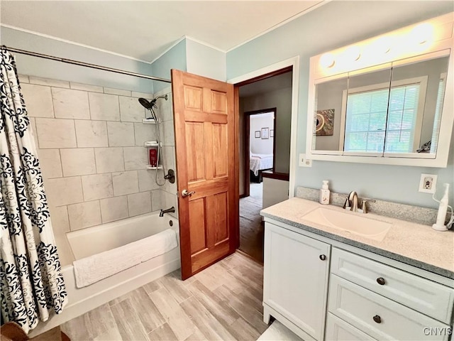 2 Whitetail Cir, Oswego-City, NY 13126 - bathroom featuring shower / bath combo with shower curtain, vanity, wood finished floors, and crown molding