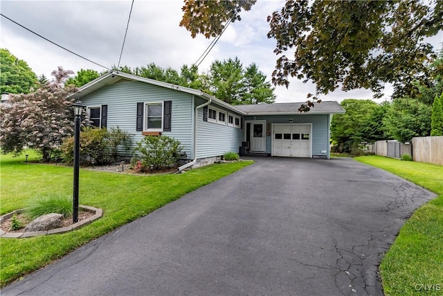 368 Northfield Way, Camillus, NY 13031 - single story home with an attached garage and asphalt driveway