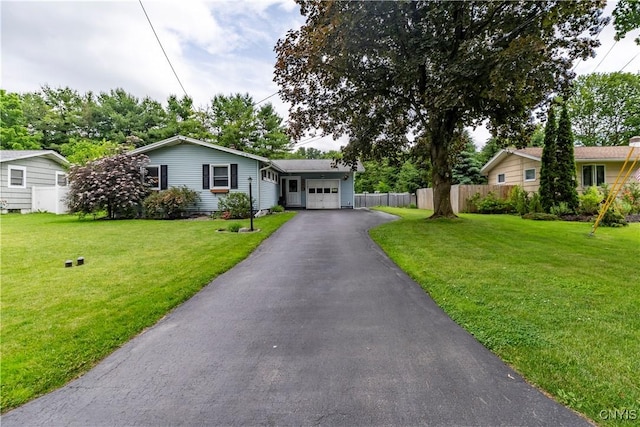 368 Northfield Way, Camillus, NY 13031 - ranch-style house featuring a garage and asphalt driveway