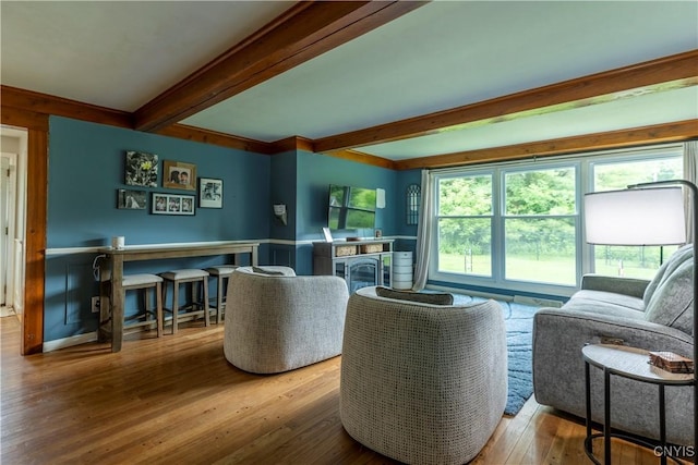 368 Northfield Way, Camillus, NY 13031 - living area with beamed ceiling, hardwood / wood-style flooring, and a wainscoted wall