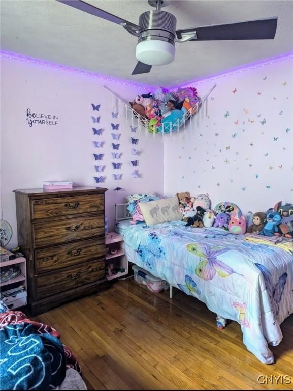 538 Seneca St, Oneida-Inside, NY 13421 - bedroom with wood finished floors and a ceiling fan