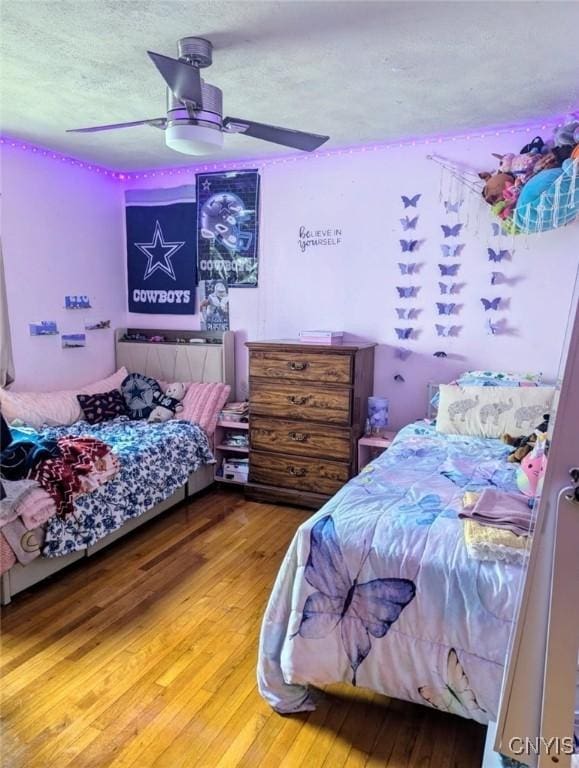 538 Seneca St, Oneida-Inside, NY 13421 - bedroom featuring wood finished floors and ceiling fan