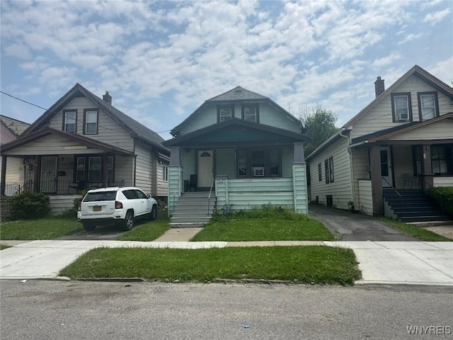 79 Freund St, Buffalo, NY 14215 - view of front of home with covered porch and concrete driveway