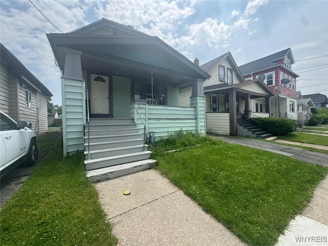 79 Freund St, Buffalo, NY 14215 - view of front facade featuring covered porch