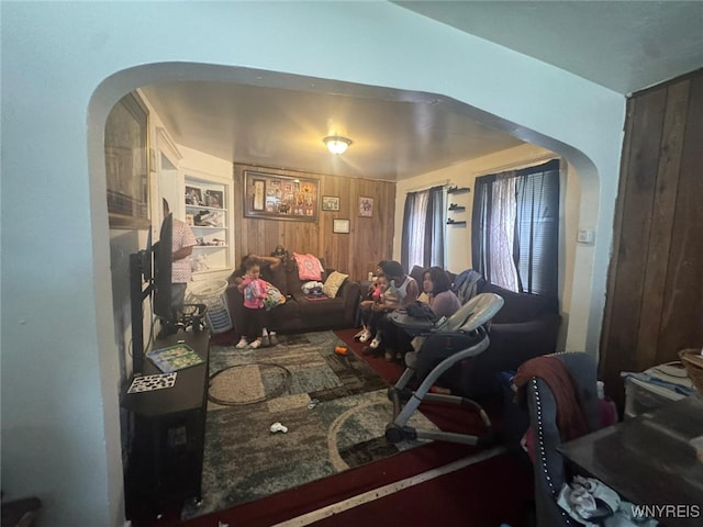 79 Freund St, Buffalo, NY 14215 - living area featuring arched walkways and wood walls