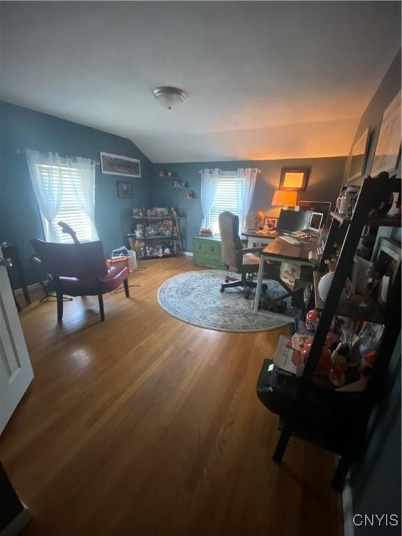 131 Wheaton Rd, Syracuse, NY 13203 - home office featuring wood finished floors and vaulted ceiling
